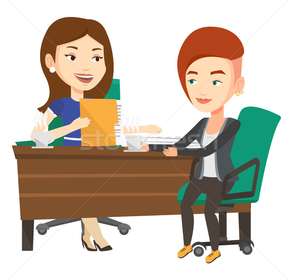 Two businesswomen during business meeting. Stock photo © RAStudio