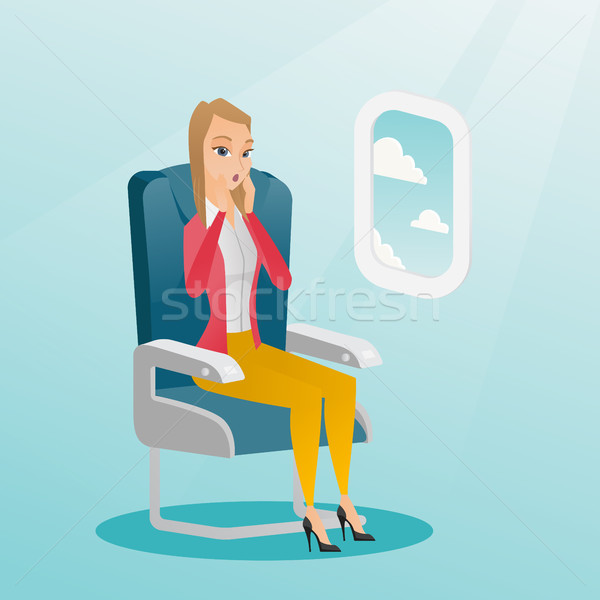 Young caucasian woman suffering from aerophobia. Stock photo © RAStudio