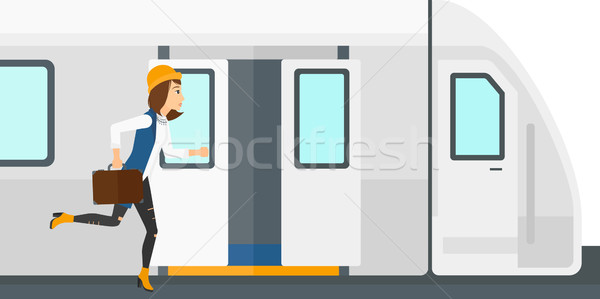 女性 行方不明 列車 を実行して プラットフォーム に達する ストックフォト © RAStudio
