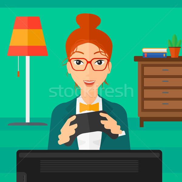 Woman playing video game. Stock photo © RAStudio