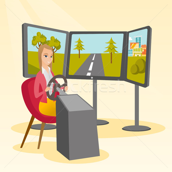 Young woman playing video game with gaming wheel. Stock photo © RAStudio