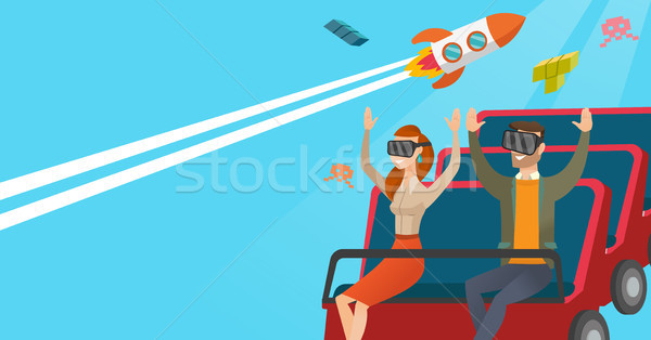 Couple in vr headset riding on a roller coaster. Stock photo © RAStudio