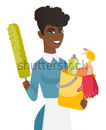 Cleaner holding bucket full of cleaning equipment. Stock photo © RAStudio