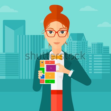 Woman with modular phone. Stock photo © RAStudio