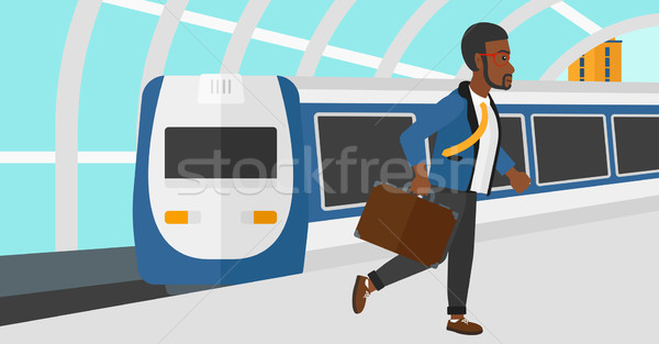Stock photo: Man going out of train.