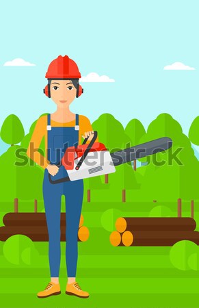 Lumberjack with chainsaw. Stock photo © RAStudio