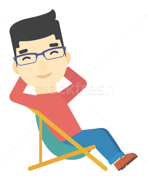 Man sitting in a folding chair. Stock photo © RAStudio