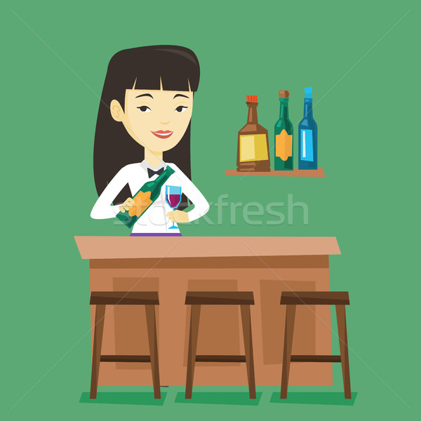 Bartender standing at the bar counter. Stock photo © RAStudio