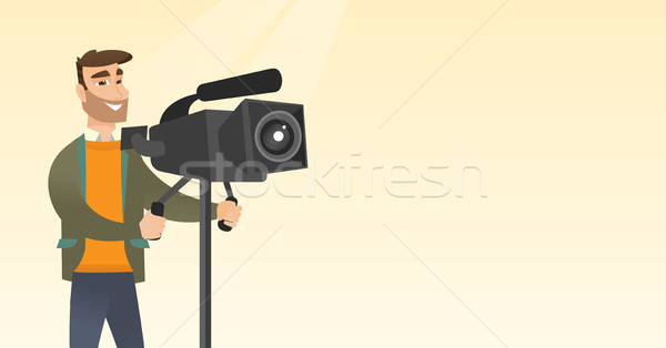 Kareraman film kamera állvány hipszter szakáll néz Stock fotó © RAStudio
