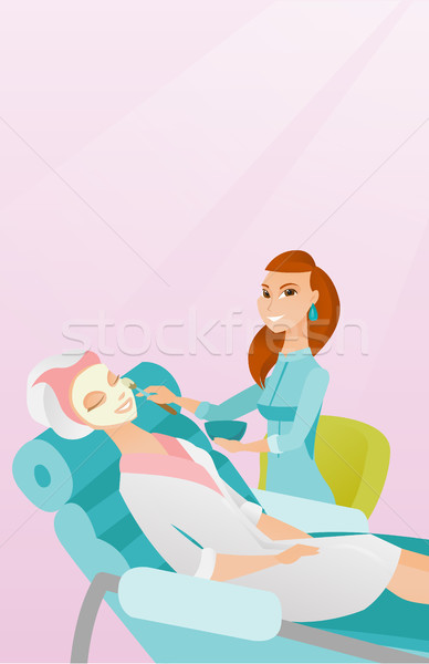 Woman in beauty salon during cosmetology procedure Stock photo © RAStudio