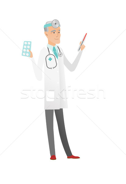 Otolaryngologist holding thermometer and pills. Stock photo © RAStudio