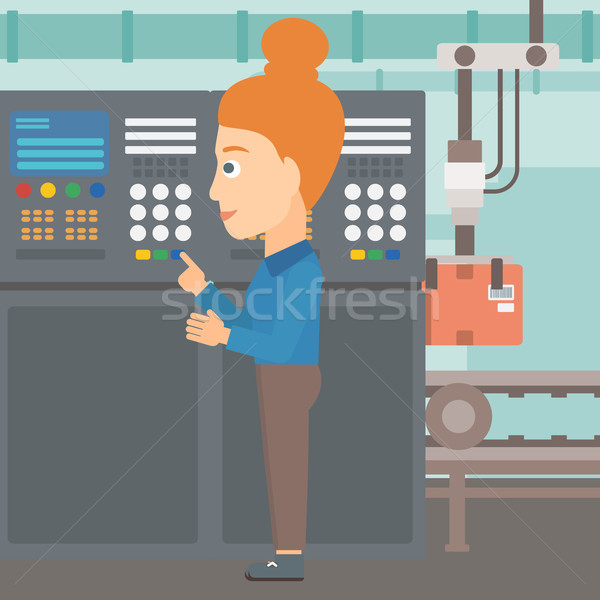 Stock photo: Engineer standing near control panel.