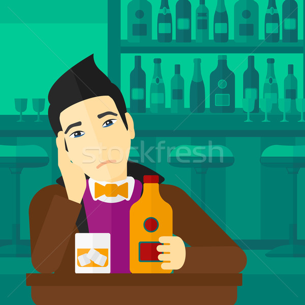 Sad man with bottle and glass. Stock photo © RAStudio