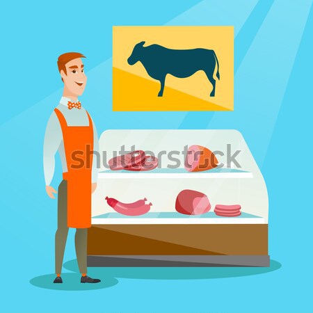 Butcher offering fresh meat in butchershop. Stock photo © RAStudio