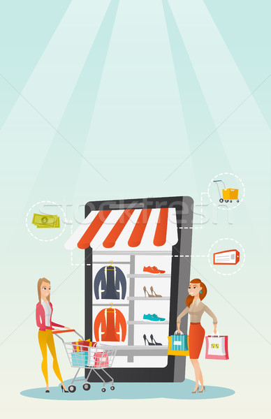 Women walking in store that looks like a tablet. Stock photo © RAStudio