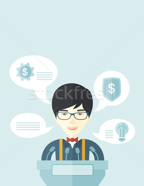 Stock photo: Chinese speaker stand behind a podium.