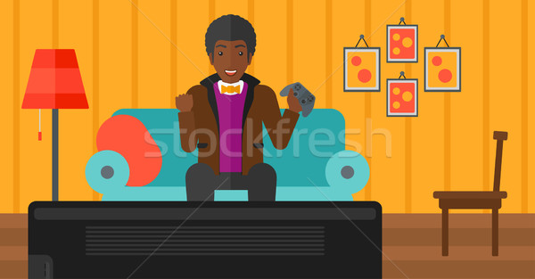 Man playing video game. Stock photo © RAStudio