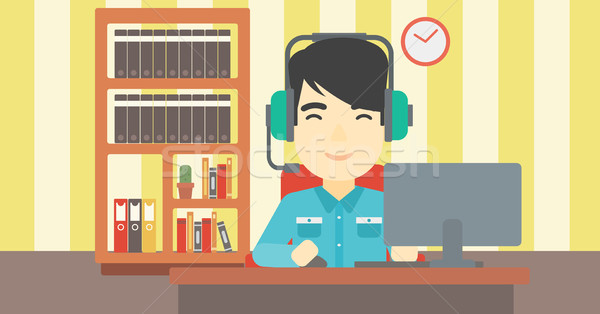 Człowiek gry gra komputerowa asian salon słuchawki Zdjęcia stock © RAStudio