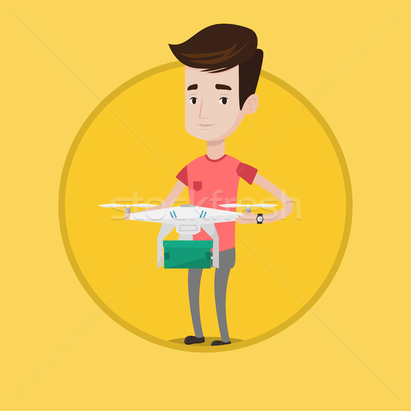 Man controlling delivery drone with post package. Stock photo © RAStudio
