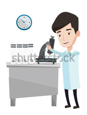 Foto stock: Laboratório · assistente · microscópio · asiático · trabalhando · jovem