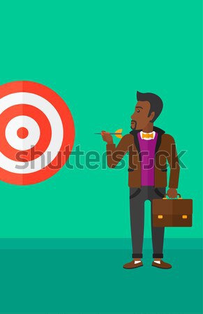 Businessman with target board. Stock photo © RAStudio
