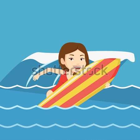 Happy surfer in action on a surf board. Stock photo © RAStudio