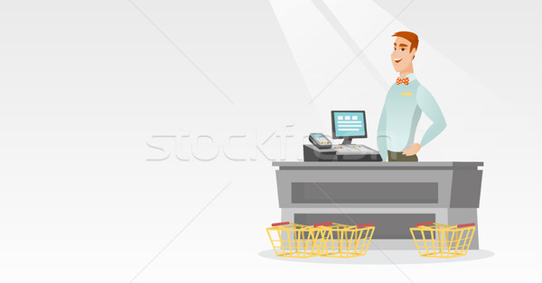 Cashier standing at the checkout in a supermarket. Stock photo © RAStudio