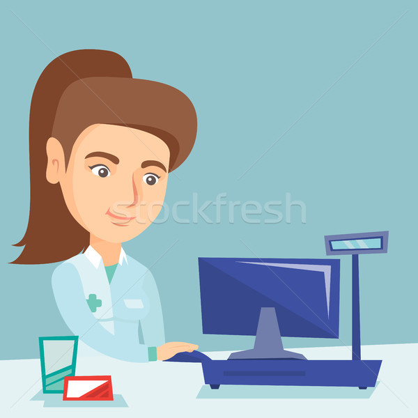 Pharmacist working on a computer in a drugstore. Stock photo © RAStudio