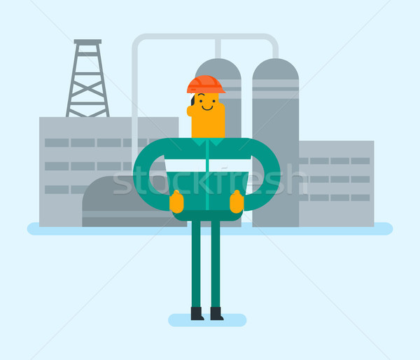 Caucasian man standing on the background of plant. Stock photo © RAStudio