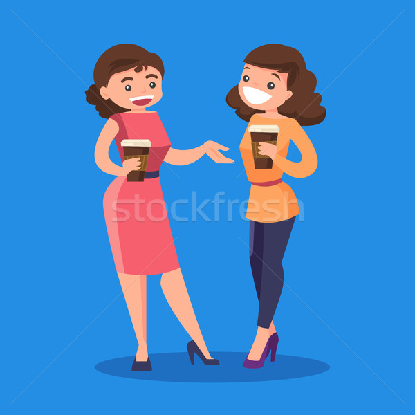 Two caucasian white business women drinking coffee Stock photo © RAStudio