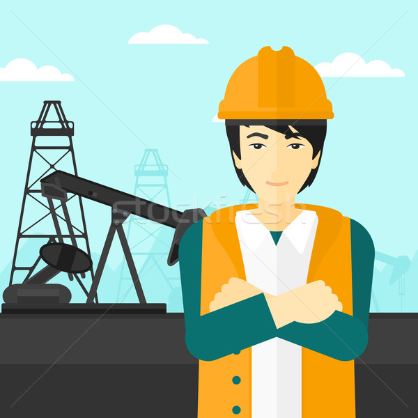 Stock photo: Cnfident oil worker.