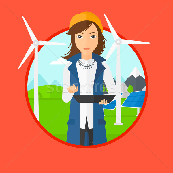 Kobiet pracownika energia słoneczna roślin farma wiatrowa Zdjęcia stock © RAStudio