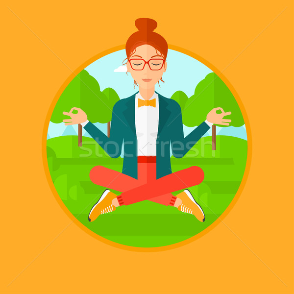 Business woman meditating in lotus position. Stock photo © RAStudio