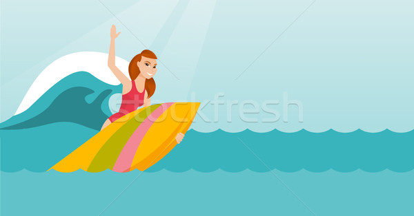 Young caucasian surfer in action on a surfboard. Stock photo © RAStudio