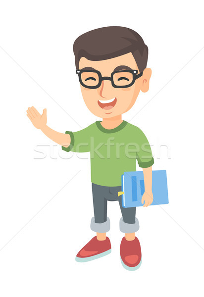 Caucasian laughing boy in glasses holding a book. Stock photo © RAStudio