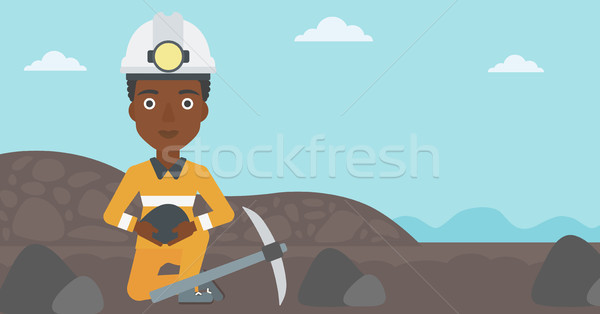 Miner holding coal in hands vector illustration. Stock photo © RAStudio