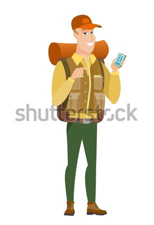 Young caucasian traveler laughing out loud. Stock photo © RAStudio