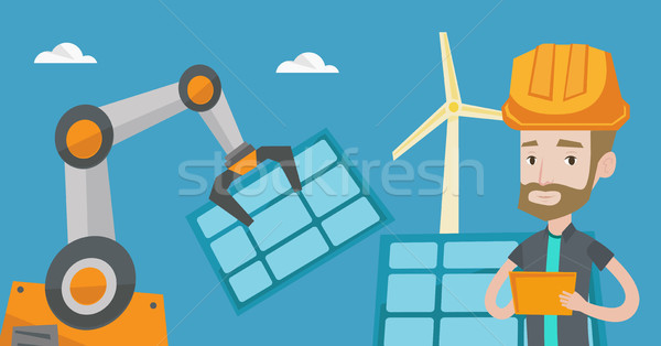 Robotic arm installing solar power pannel. Stock photo © RAStudio