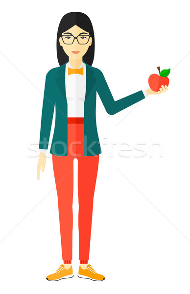 Woman holding apple. Stock photo © RAStudio