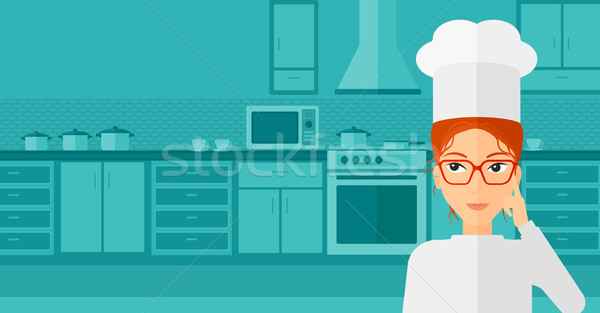 Chef pointing forefinger up. Stock photo © RAStudio