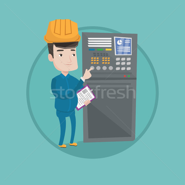 Engineer standing near control panel. Stock photo © RAStudio