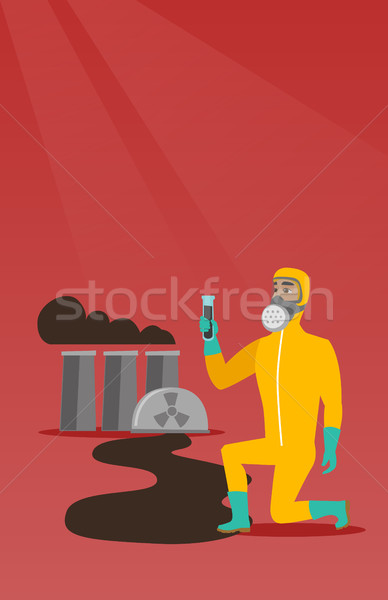 Man in gas mask and radiation protective suit. Stock photo © RAStudio