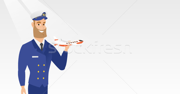 Wesoły linia lotnicza pilota model samolot młodych Zdjęcia stock © RAStudio