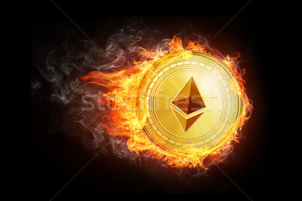Golden ethereum coin flying in fire flame. Stock photo © RAStudio