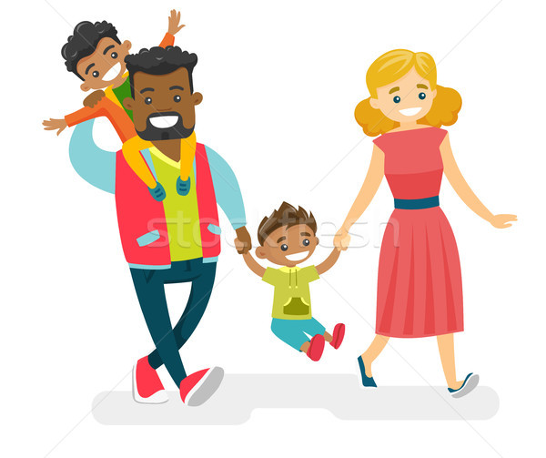 Stock photo: Happy multiracial family walking and having fun.