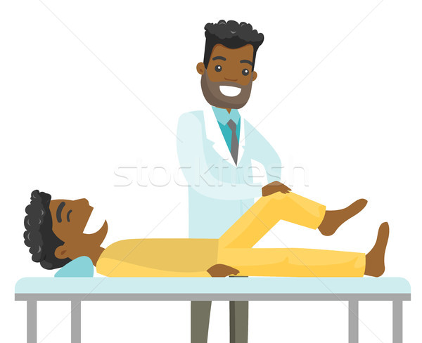 Afryki nogi pacjenta lekarza kostka masażu Zdjęcia stock © RAStudio