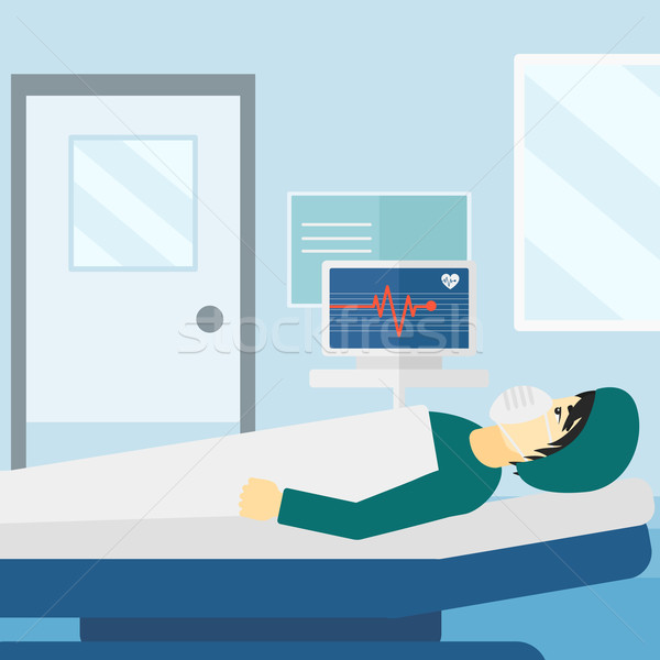 Patient lying in hospital  bed with heart monitor. Stock photo © RAStudio
