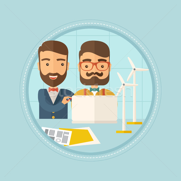 Engineers of wind farm working on laptop. Stock photo © RAStudio