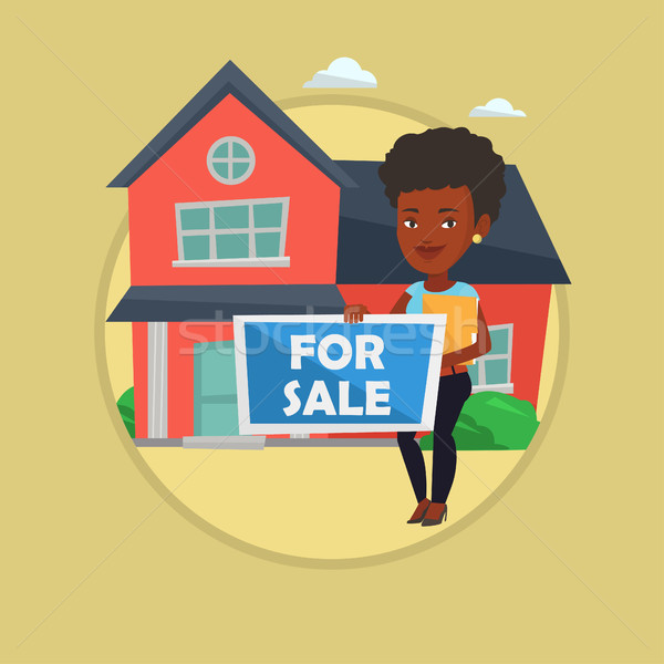 Młodych kobiet pośrednik w sprzedaży nieruchomości oferowanie domu Afryki Zdjęcia stock © RAStudio