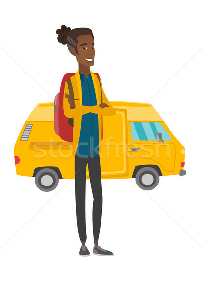 Stock photo: Traveler standing on the background of minibus.